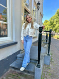 JEANS CHLOE LICHTBLAUW WIDELEG MET TIE DYE ONDERKANT